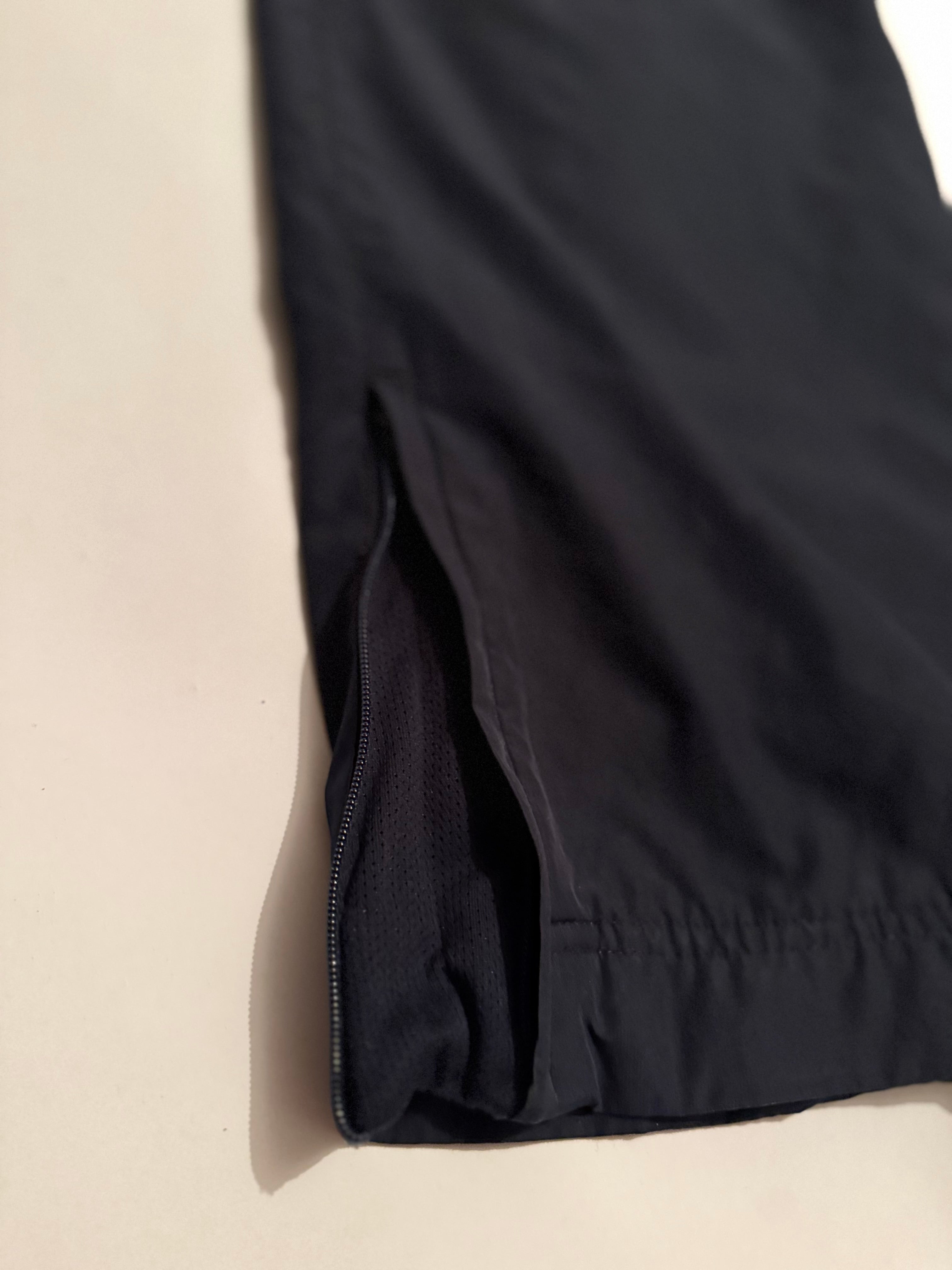 Nike Track Pants – Black with White Swoosh